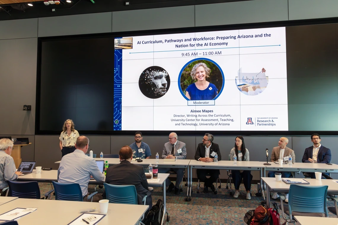 Aimee Mapes, University of Arizona WAC Director, mediated the panel