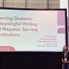 Three women standing in front of a presentation slide titled "Serving Students: Meaningful Writing at Hispanic-Serving Institutions" at the CCCC 2026 conference in Cleveland, Ohio.